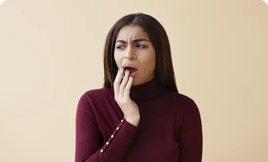 Woman having difficulty opening or closing her mouth