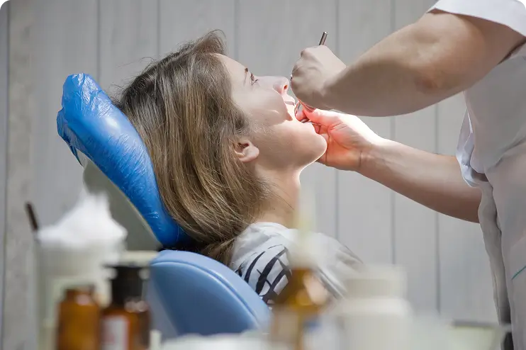 Dentist providing long-term TMJ care to a patient