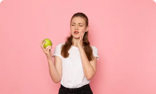 Woman experiencing pain while chewing