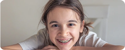 Teenager aged 13–18 with braces treatment at Power Smiles Dental